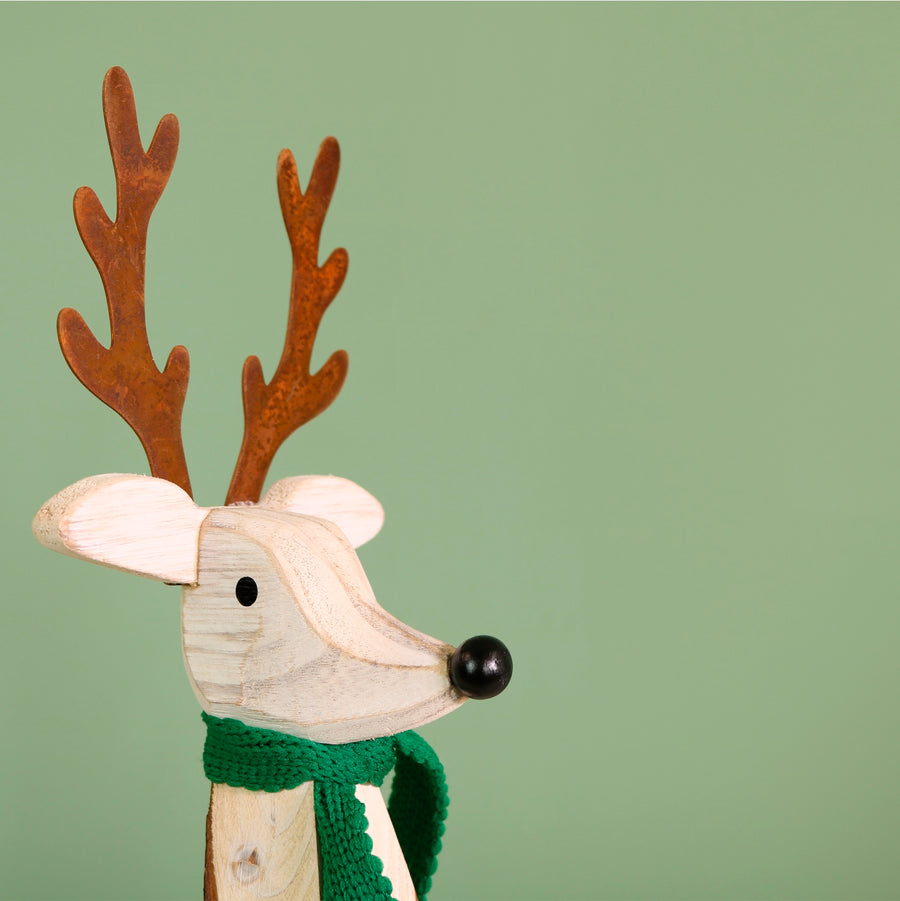 Festive Wooden Carved Prancer Reindeer