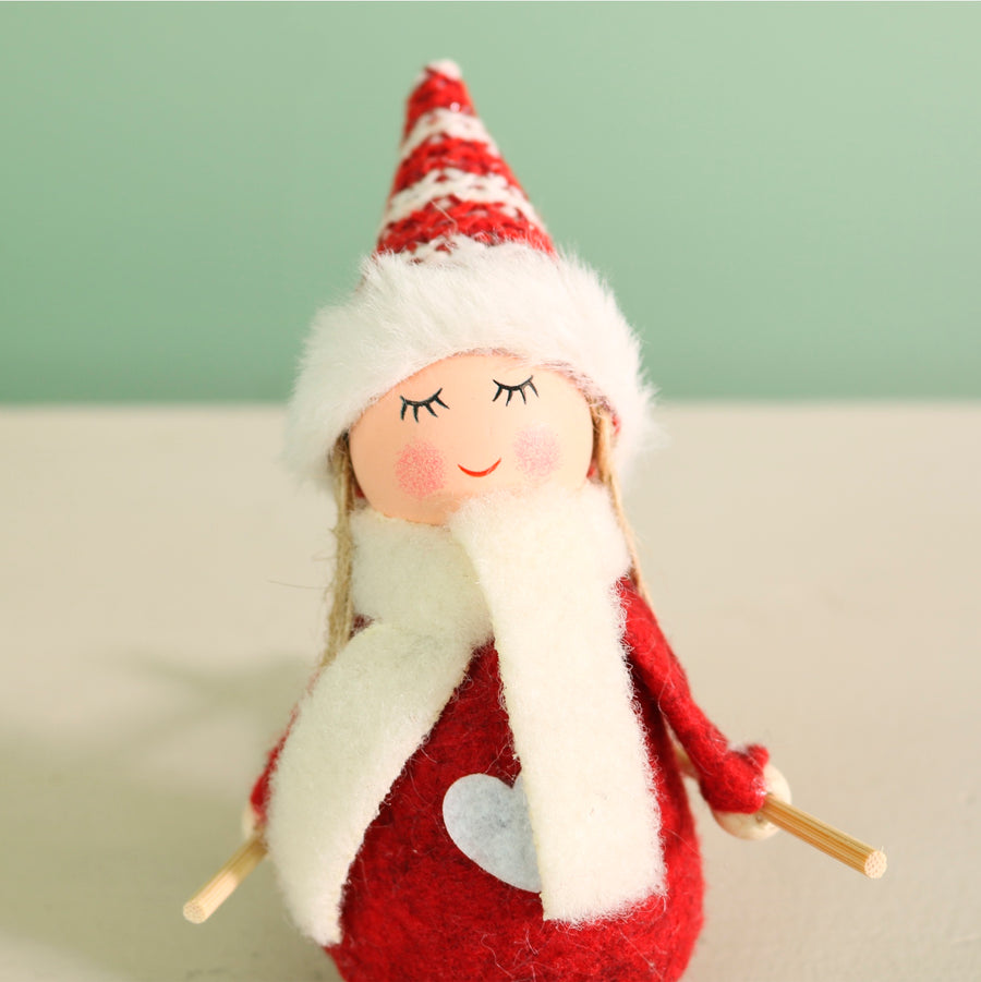 Festive Aurora Doll Skiing